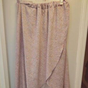 Floral Maxi skirt with split. Flowy and purple in color.
